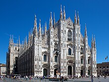Milan Cathedral is a busy tourist spot in Milan. It is the world's 3rd biggest cathedral and took over five centuries to complete. Milan Cathedral from Piazza del Duomo.jpg
