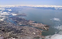 Aerial view with Port of Oakland and the bay Port of Oakland and Alameda Island aerial.jpg