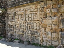 Puuc-style geometric design on a wall of the great temple of Uxmal. Uxmal-Great-Pyramid-Sculptured-Temple.jpg