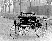 A photograph of the original Benz Patent Motorwagon, first built in 1885 and awarded the patent for the concept