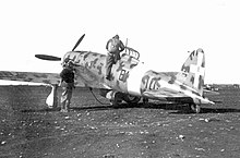 An Italian pilot climbs into a Macchi 202 during the battle An Italian pilot about to enter into a Macci 202 during the battle.jpg