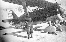 Xu Jixiang of the 17th PS, 5th PG with an I-15bis; the fighter he fought in the A6M Zero fighter's debut aerial-combat engagement on 13 September 1940 over Chongqing Chinese Polikarpov I-15bis.jpg