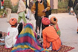 Market bargaining in Dilli Haat (Delhi) Dilli Haat bargaining.jpg