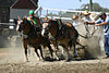 Horses pulling concrete blocks (1306933287).jpg
