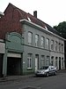 Burgerwoning met achterliggend magazijn van 1934