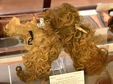 Yellow curly hair and scalp from body which had long black wig over hair. Parts of wig plait remains. From Egypt, Gurob, probably tomb 23. 18th-19th Dynasty. The Petrie Museum of Egyptian Archaeology, London Yellow curly hair and scalp from body which had long black wig over hair. Parts of wig plait remains. From Egypt, Gurob, probably tomb 23. 18th-19th Dynasty. The Petrie Museum of Egyptian Archaeology, London.jpg