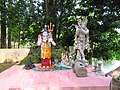 Figures outside Shiva Mandir