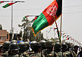 Bendera Afghanistan saat penyerahan Lashkargah (2011)