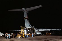The Apollo 11 Mobile Quarantine Facility is unloaded from a C-141 at Ellington Air Force Base, 27 July 1969. Apollo 11 Mobile Quarantine Facility unloaded from C-141.jpg