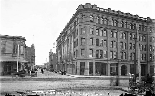 When it opened in 1894, the Bradbury Building towered above its neighbors and became the southwestern anchor of the business district, then centered around First and Main.[29]