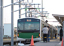 EV-E301 charging from the overhead conductor bar EV-E300-1 V1 at karasuyama station.JPG