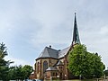 Martin-Luther-Kirche mit Ausstattung, vier Grufthäuser, Kirchhofstor und Reste der Kirchhofmauer des ehemaligen Kirchhofs sowie Kirchenvorplatz (einzig erhaltene Reste des alten Kirchhofs) und mit kleiner vorgelagerter Parkanlage