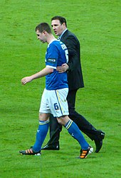 Mackay (right) after Cardiff City were beaten in the 2012 League Cup Final Gerrard Mackay.jpg