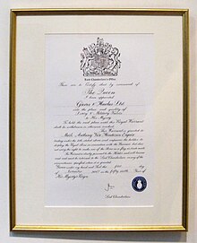 Royal warrant from Queen Elizabeth II on display at Savile Row tailor Gieves & Hawkes Gieves Hawkes 2519.JPG