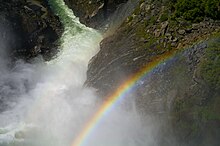 Rainbows are formed by dispersion of light, in which the refraction angle depends on the light's frequency. Hetch Hetchy Releases (5910591819).jpg