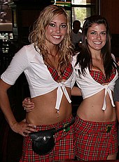 Waitresses of Tilted Kilt Pub & Eatery restaurant in uniform. Tilted Kilt has skimpily dressed waitresses, and is thus an example of a breastaurant. Kilt Girls.jpg