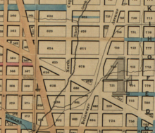 Detail showing the paved areas in Swampoodle around Tiber Creek, c. 1873 Map of Washington D.C. showing wood, concrete, and stone street pavements by William James Map (Detail).png