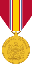 The obverse view of the medal shows the American bald eagle, perched on a sword and palm. Above this, in a semicircle, is the inscription National Defense.