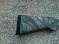 Remington 870 shotgun equipped with a recoil pad
