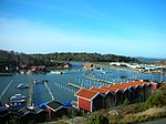 Eskils kanal med Önnereds båthamn i förgrunden. Lilla Rösö rakt fram till vänster och stora rösö rakt fram.