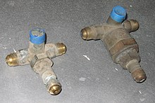 Two Sherwood valves. 1995 on left, 1989 on right AutogasSherwoodValves.JPG