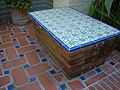 Contemporary use of Malibu style tile with red brick