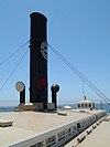 Photograph of the funnel of the ferry Berkeley from the vessel's roof, showing the Southern Pacific logo on the side of the stack.