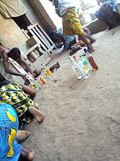 Prayers and libations made with gin, in a community in southern Benin Ceremonies coutumieres.jpg