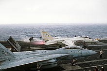 An F-14A of VF-32 prepares to launch from John F. Kennedy during her 1986 Mediterranean cruise. F-14A VF-32 Exercise Display Determination Mediterranean 1986.JPEG