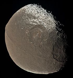 A global view of Iapetus obtained by the Cassini spacecraft on Dec. 31, 2004 - the first-ever clear image of the ridge - at a distance of about 172,900 kilometers (107,435 miles).[11] The massive structure clearly distorts the shape of the moon at the equator.