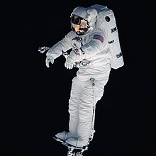 Astronaut Peter Wisoff on a robotic arm, 1993 STS057-89-067 - Wisoff on the Arm (Retouched).jpg