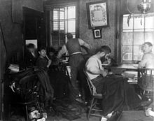 A sweatshop in a New York tenement building, c. 1889 Sweatshop in Ludlow Street Tenement, New York cph.3a24271.jpg