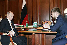 Kadyrov (right) with Russian President Vladimir Putin in February 2008 Vladimir Putin 14 February 2008-18.jpg