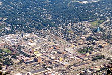 The majority of the U.S. population lives in suburbs. Above: Nassau County, New York on Long Island lies immediately east of New York City. Aerial view of Hempstead, July 2019.JPG