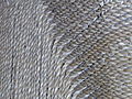 Detail of woven fibers of a carpet