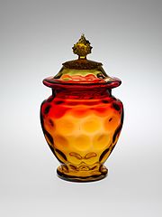 bowl with lid and reddish-goldish glass