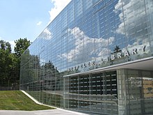 The new Hespeler Library was created by building a glass cube around the historic Carnegie library. The environmentally responsible building features recycled white oak floors and a ceramic treatment on the glass to reduce sunlight intensity. Hespeler-Library-Cambridge-.jpg