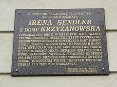 A bronze plaque in Piotrków Trybunalski telling some of her story