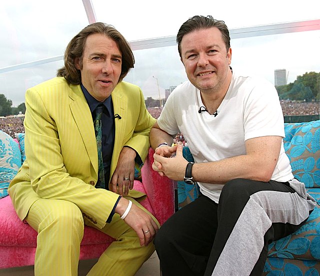 Colour photograph of Jonathan Ross and Ricky Gervais sitting next to each other in July 2005