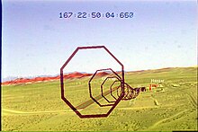 Illustration of a LandForm video map overlay marking runways, road, and buildings