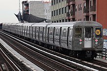 A W train of R68s leaving 39th Avenue MTA NYC Subway W train leaving 39th Ave.jpg