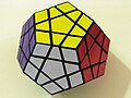 A Megaminx the colors are a little messed up, it is solved 90 % as a normal 3x3x3 cube, I dont usually solve it, the last time I solved it, it took me 12 minutes. I have in total: 8 "cubes"