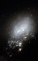 Autre version de NGC 4485 réalisée avec les données captées par le télescope spatial Hubble.