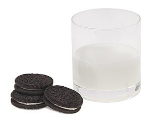 English: Regular Oreo cookies shown with milk....
