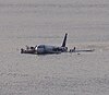 US Airways Flight 1549 (N106US) after crashing into the Hudson River (crop 1).jpg