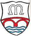 Gemeinde Münsterschwarzach In Silber über drei gesenkten, schmalen, blauen Wellenbalken eine durchgehende rote Brücke mit zwei Bogen, darüber schwebend der Großbuchstabe M[18]
