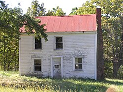 Two-story white wooden house.