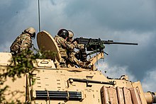 M2 uz 1. brigādes 1. kājnieku divīzijas SPG M109A7. Toruņas poligons. 2021. gada 25. augusts.