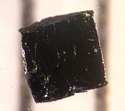 A sample of a cuprate superconductor (specifically BSCCO). The mechanism for superconductivity of these materials is unknown. BI2223-piece3 001.jpg