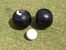 two balls with a smaller white ball in front
